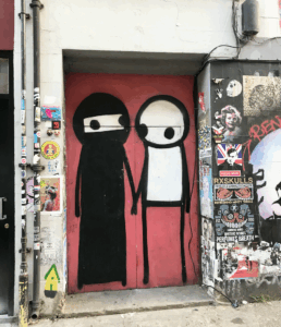 Stik-coulpe-hold-hands-princelet-street-london-image-copyright-graffitistreet-2018.png